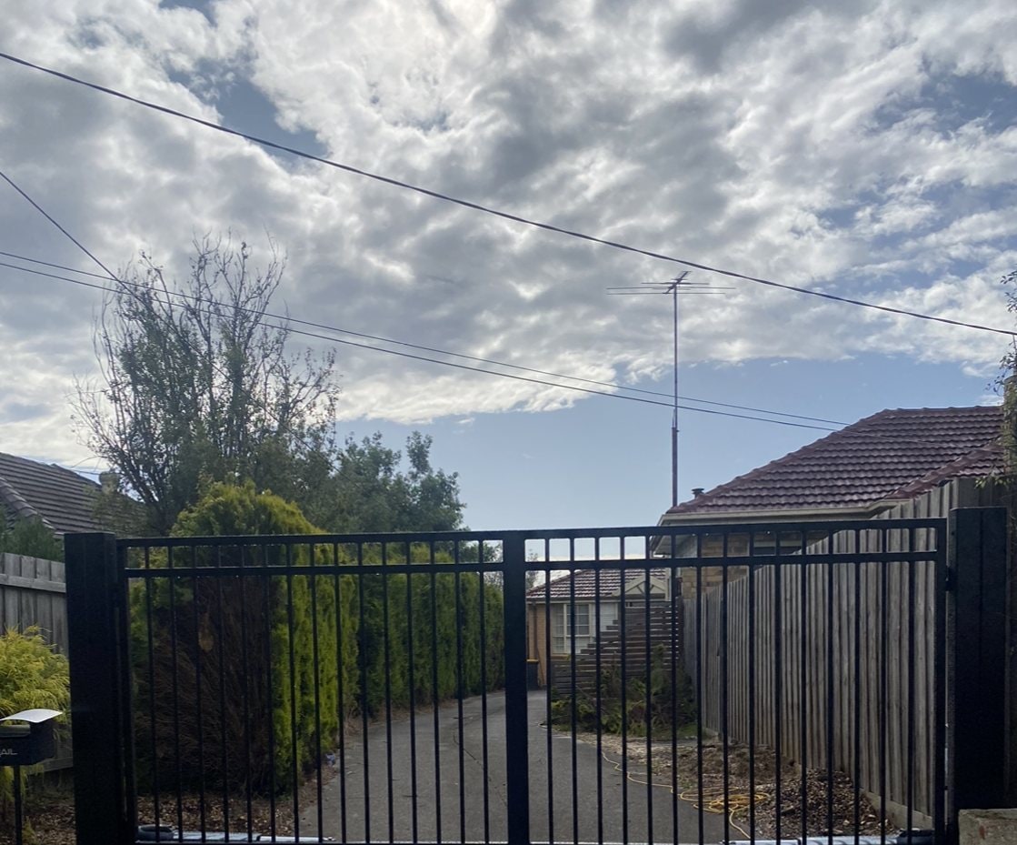 Black palisade metal driveway gates