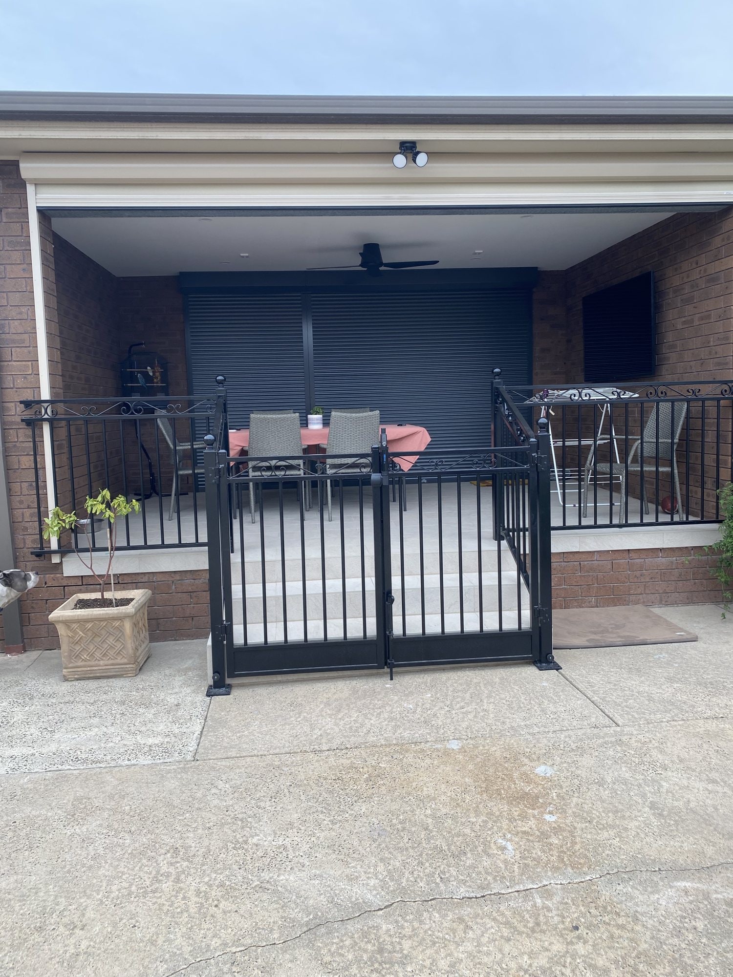 Black metal courtyard gates and railings